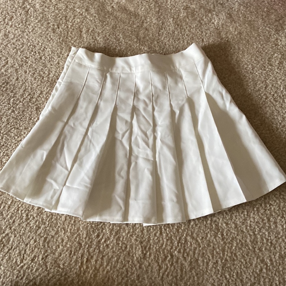 white pleated mini skirt